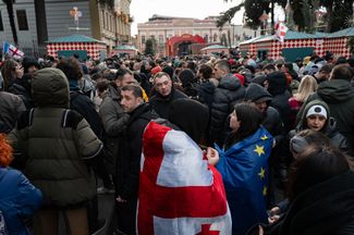 Thousands of demonstrators gather in Tbilisi as Georgia’s outgoing President Salome Zourabichvili addresses the crowd ahead of Mikheil Kavelashvili’s inauguration. December 29, 2024.